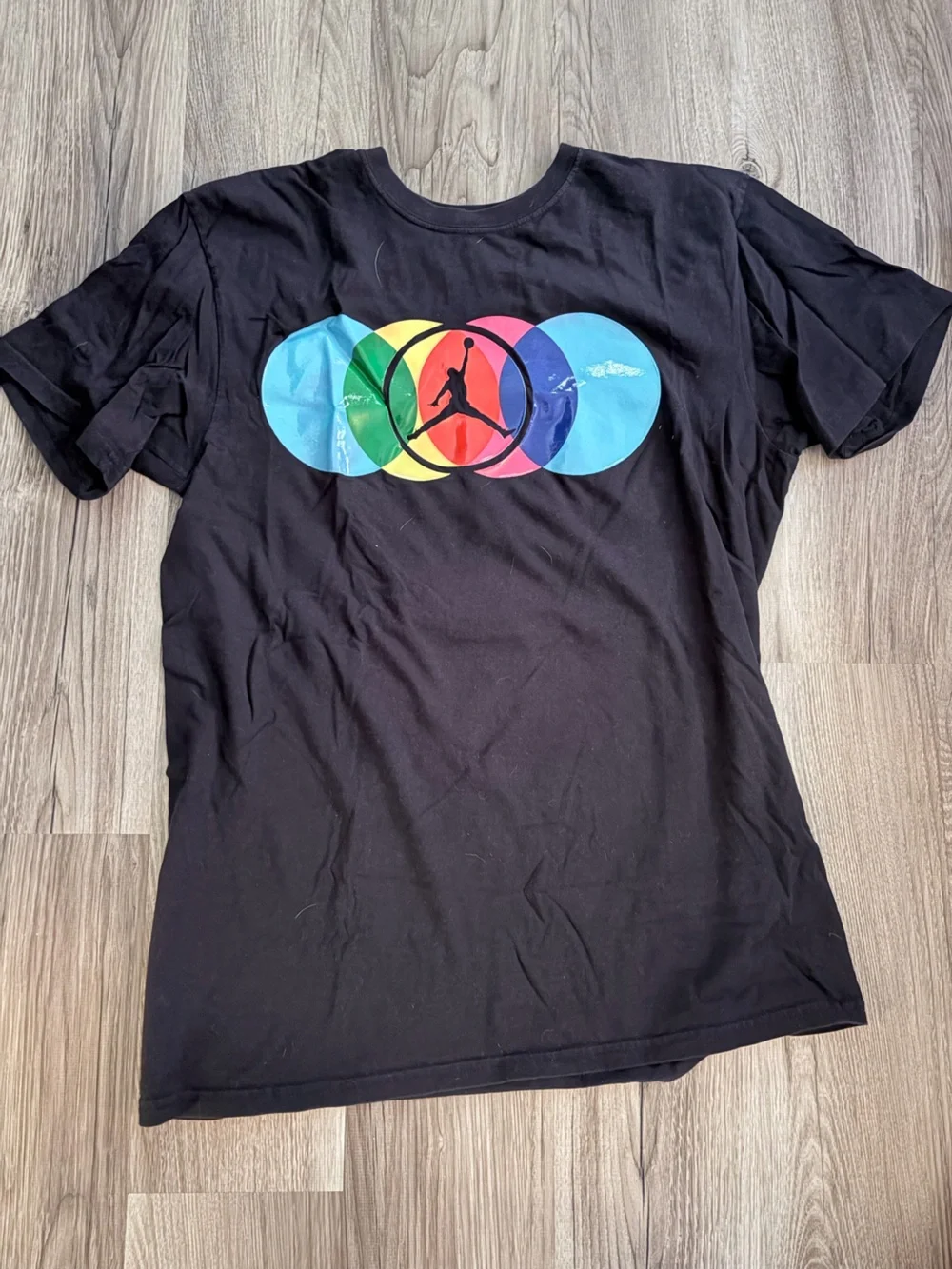 Jordan Black Tee with Multicolor Overlapping Circle Logo
